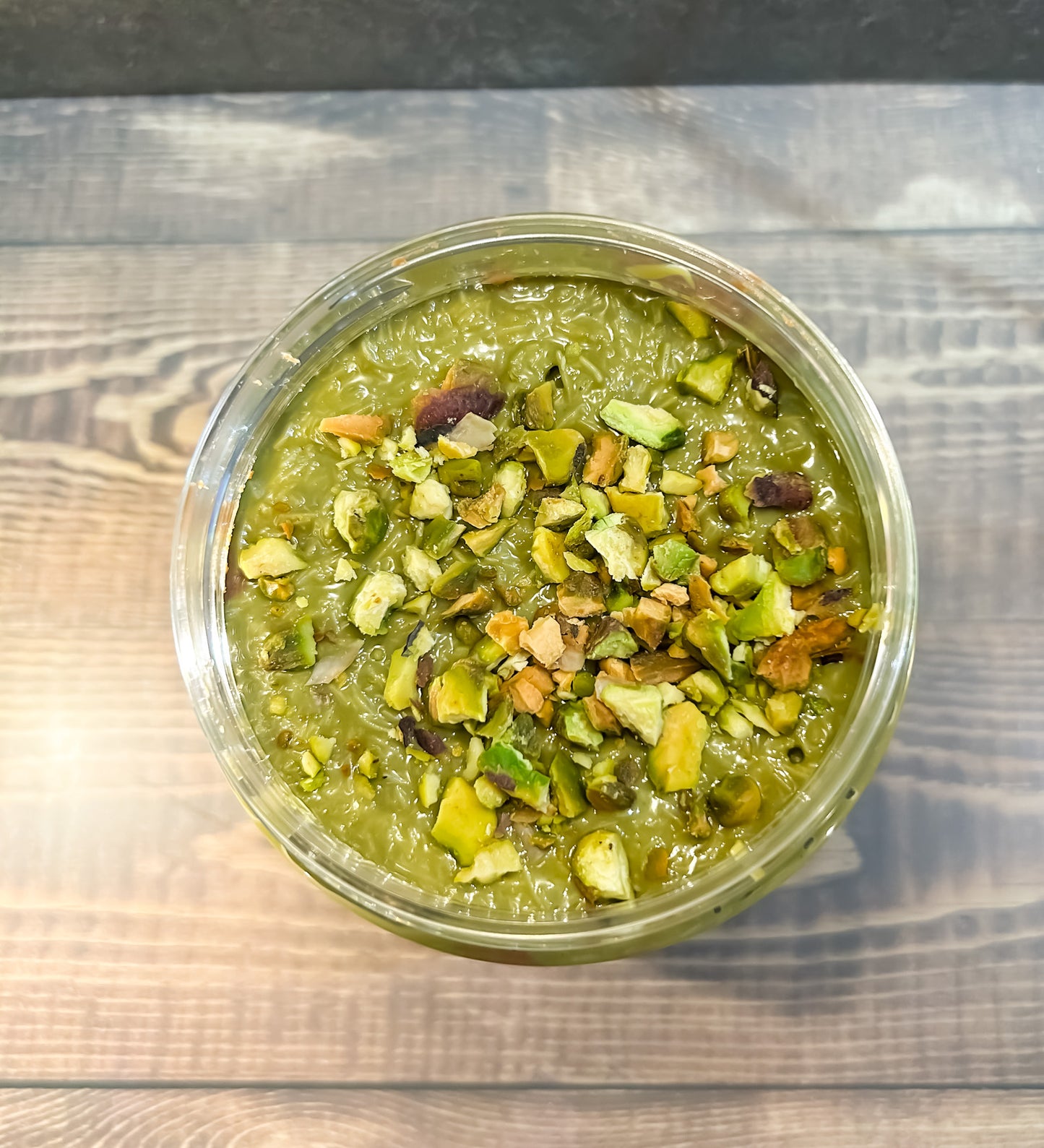 Milk chocolate peanut butter with pistachio cream and Dubai chocolate filling, topped with pistachios and sea salt