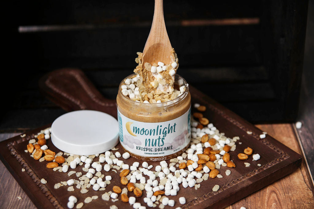 Spoonful of white chocolate peanut butter with marshmallow and rice krispies