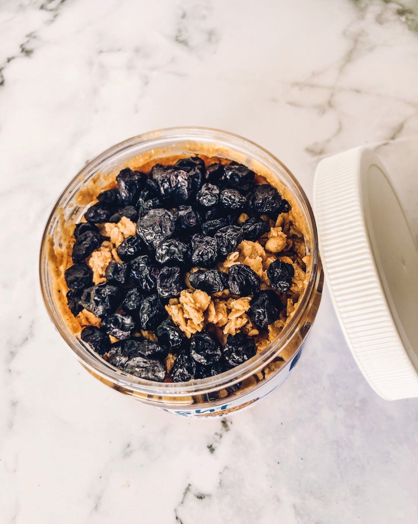 Granola and dried blueberry peanut butter