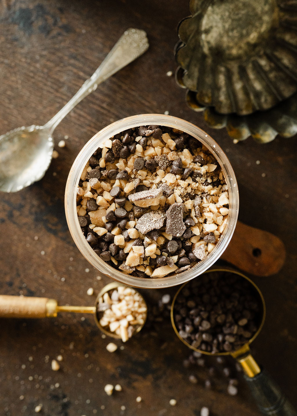 Top view of moonlight nuts grandpas favorite chocolate toffee showing heath toffee bits, mini chocolate chips, and milk chocolate peanut butter