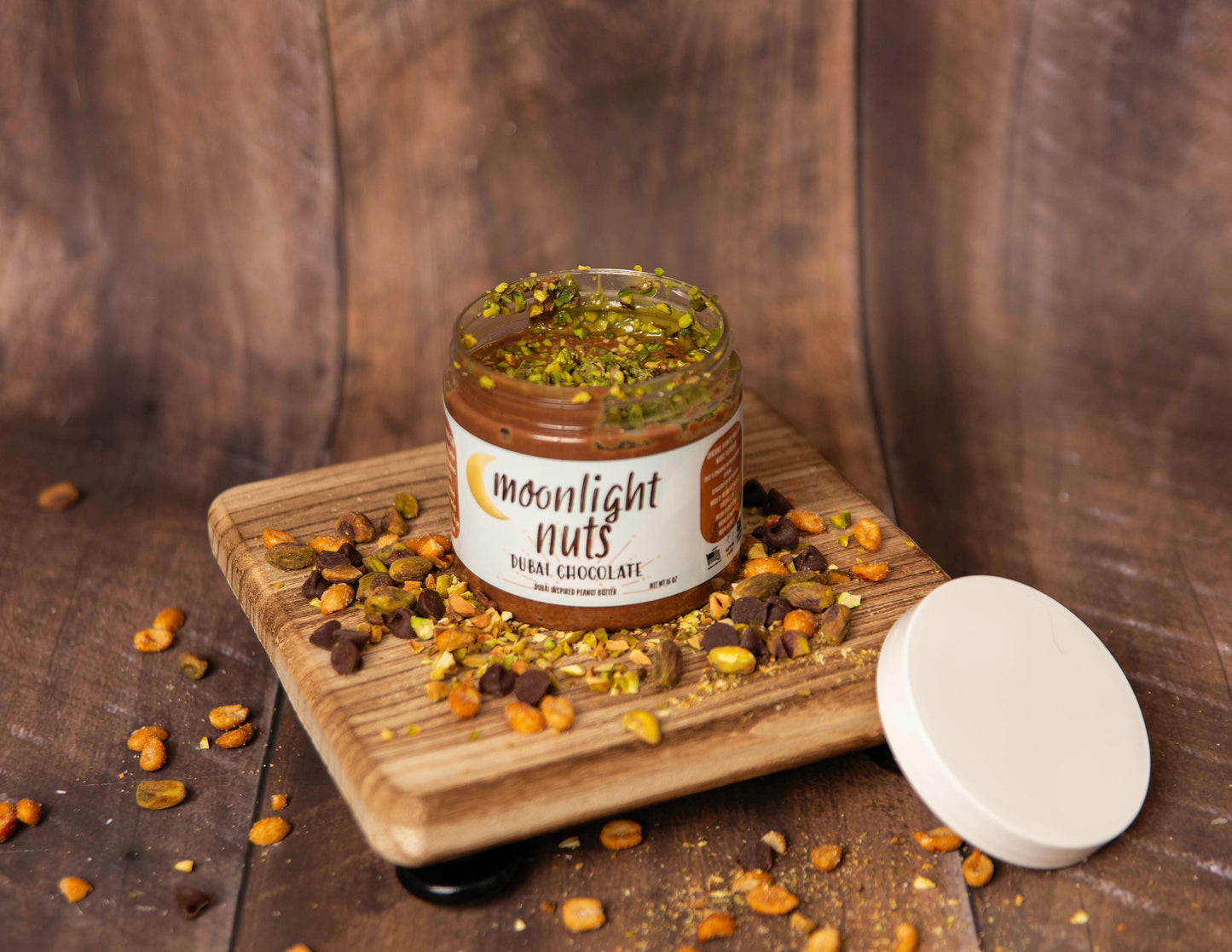 Fresh ground, small batch Dubai milk chocolate peanut butter with pistachios, pistachio cream, and Dubai filling