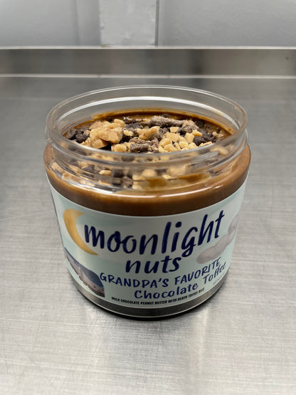 Moonlight Nuts Grandpa’s favorite- Chocolate Toffee with lid open showing the toffee bits and milk chocolate peanut butter